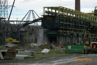 Large industrial buildings being torn down