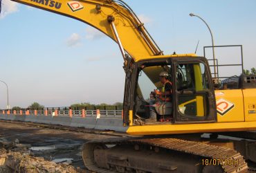 One Démex excavator and its operator.