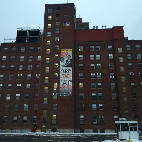 Street view showing the hospital before demolition work begins