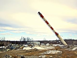 The stack falling down after weakening its base