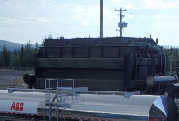 ABB truck next to a transformer purchased by Centrem and dismantled by Démex