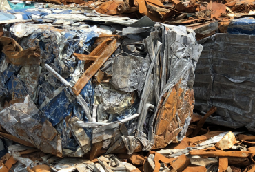 Non contaminated scrap steel bale – Bushelling #2. Piled outside Centrem recycling center in Alma.