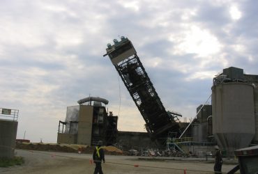 Temberc's old acid production plant metal structure falling to the ground in Kapuskasing Ontario