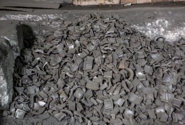 Pile of cut up andchurned pieces of metal ready for recycling at Centrem recycling center in Alma