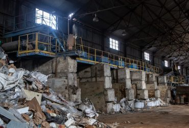 Sorting table for construction and demolition debris at Centrem recycling center in Alma